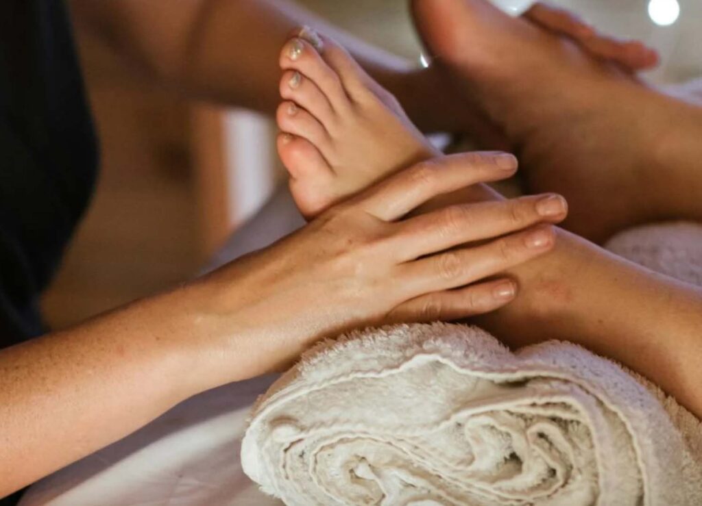 Belfiore Spa massage therapist massaging feet.