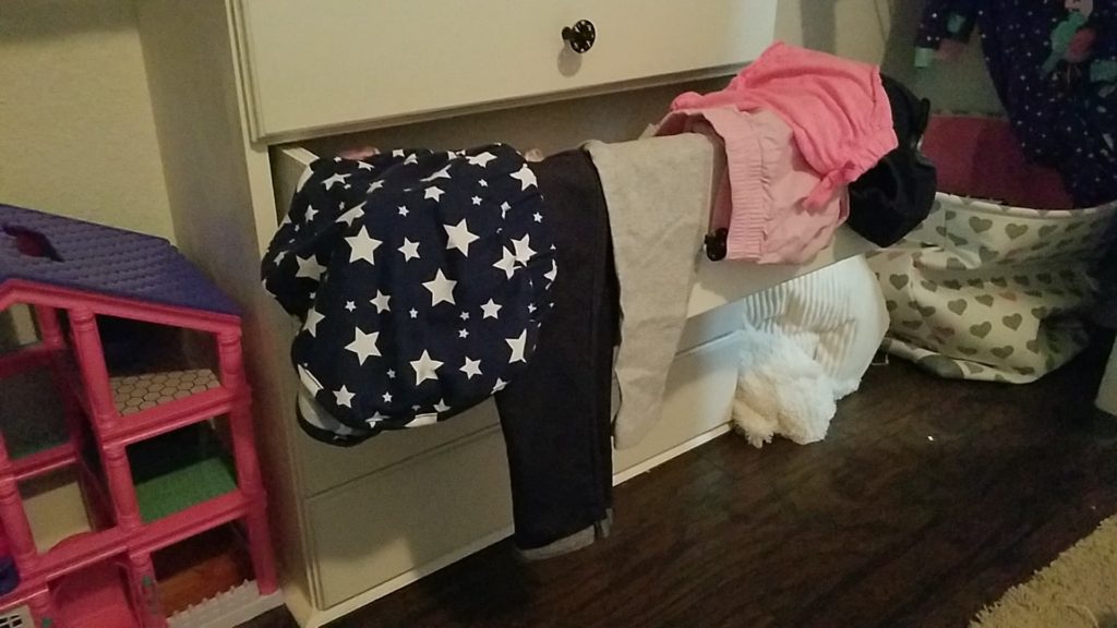 Twin Reach-In Closet Space Has 4 Drawers For Socks, Bottoms and Keepsakes