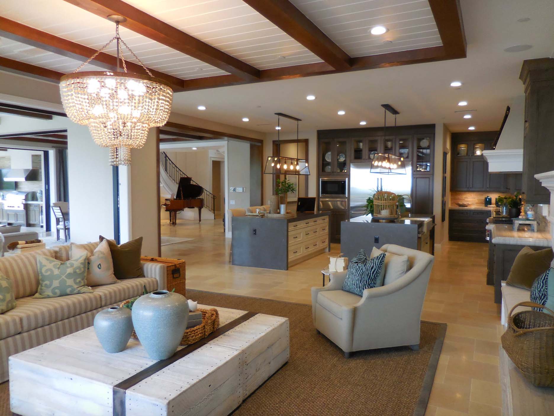 LED recessed lights on in open family room kitchen and foyer