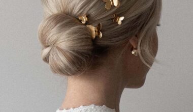 Alex Gaboury Low Bun Hairstyle with butterfly pins.