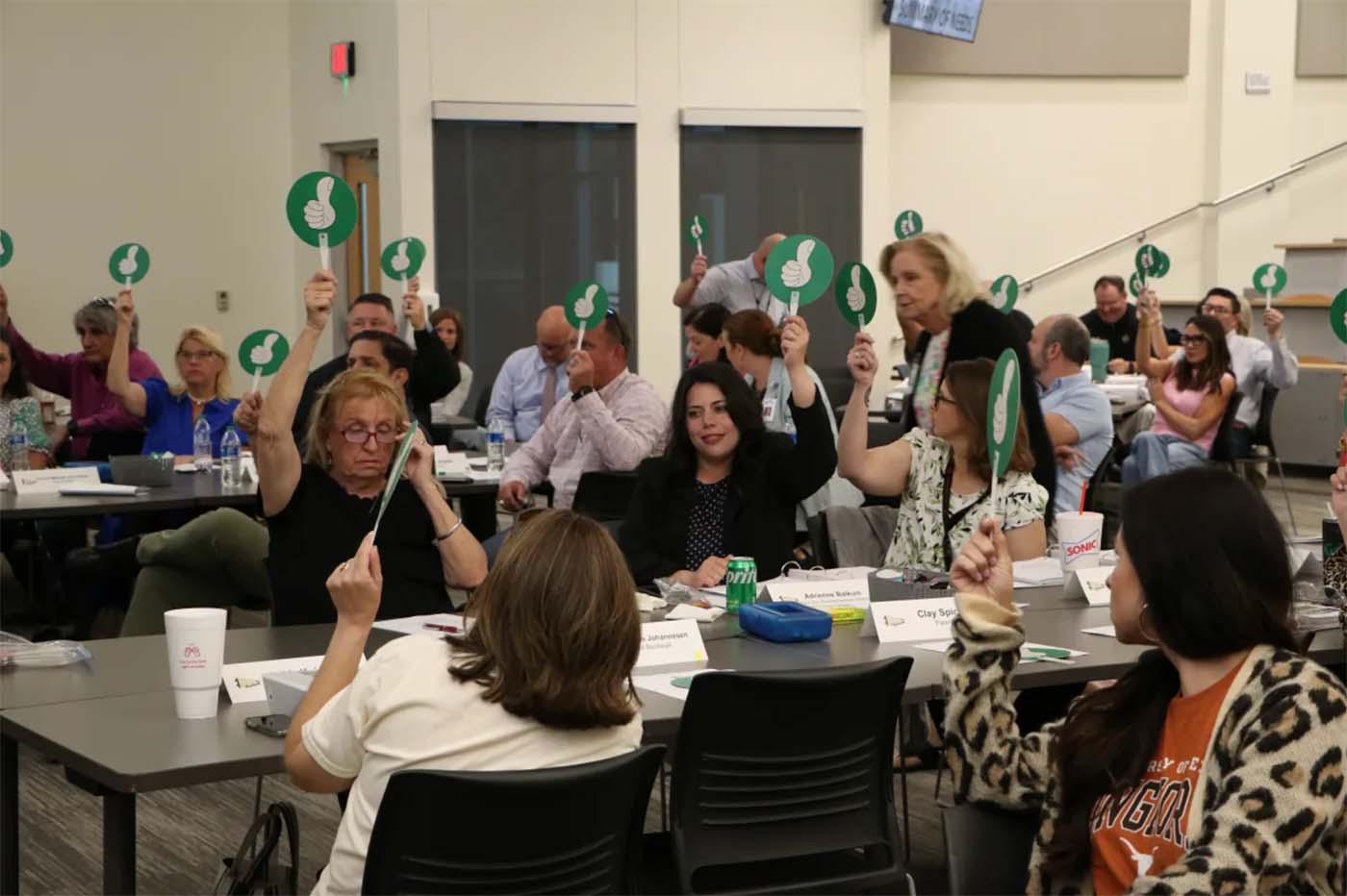 Community Leaders voting what will be in the bond presentation.