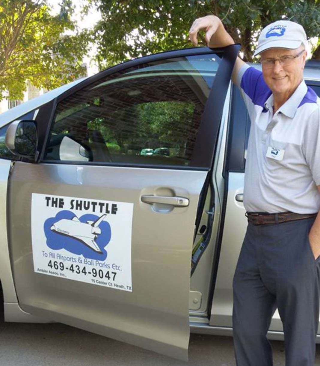 Peter Ambler opening the door of the Rockwall Shuttle Service Van.