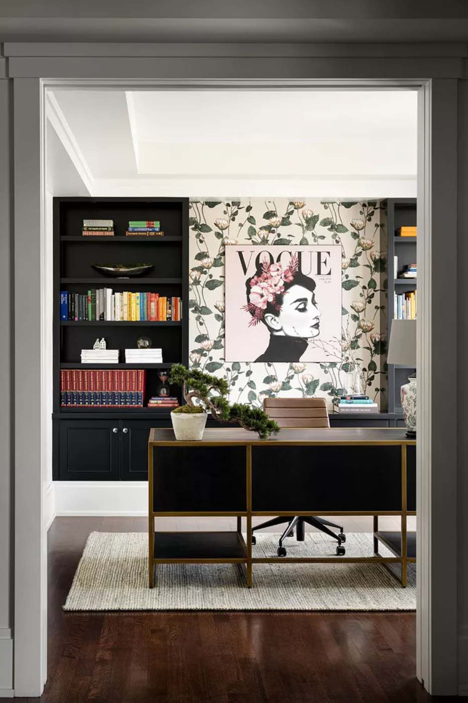 Home office work space with Vogue Cover Art