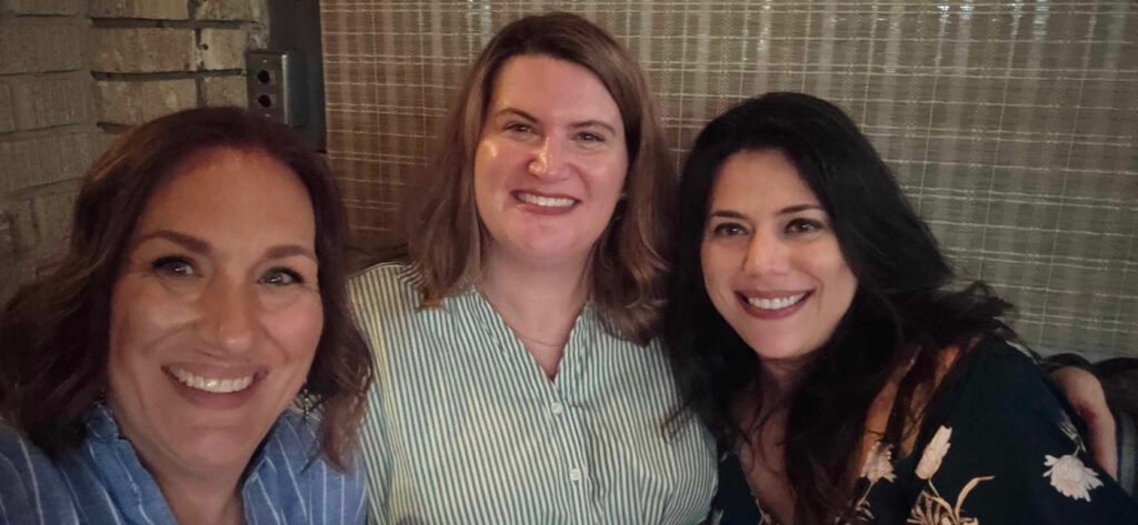 Friends visiting the Sisters Restaurant