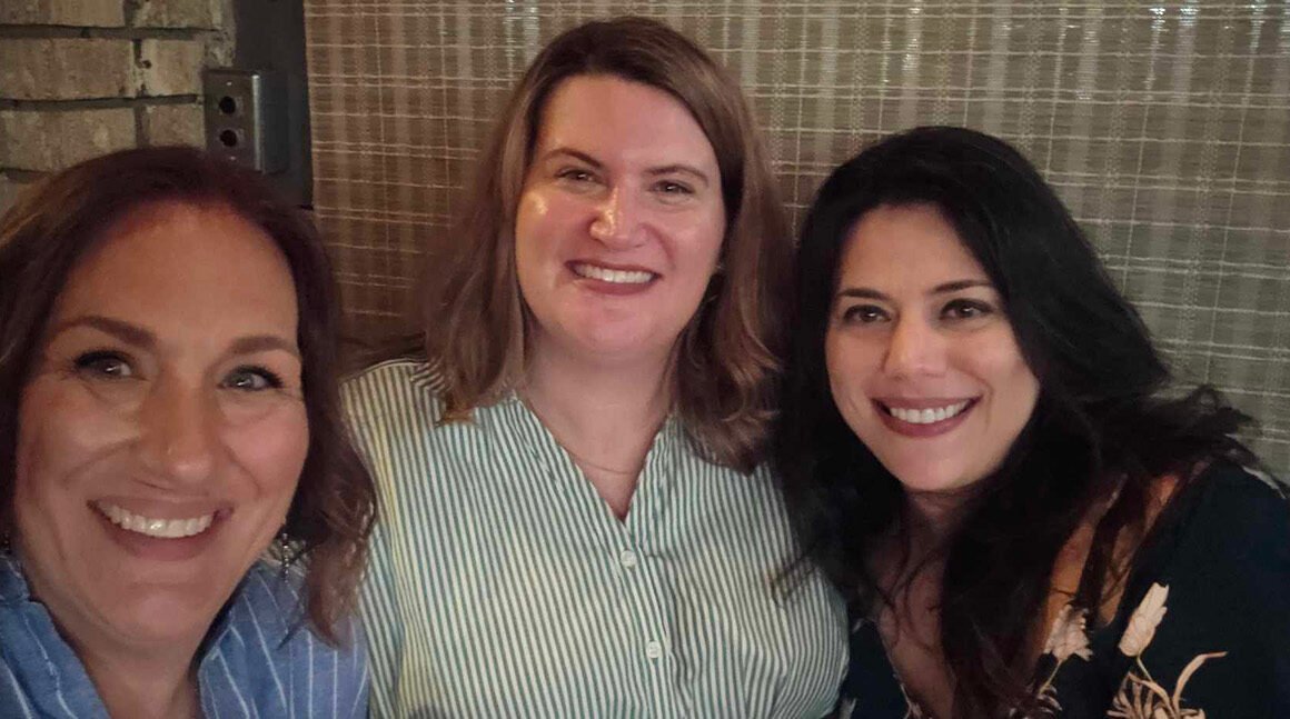 Friends visiting the Sisters Restaurant