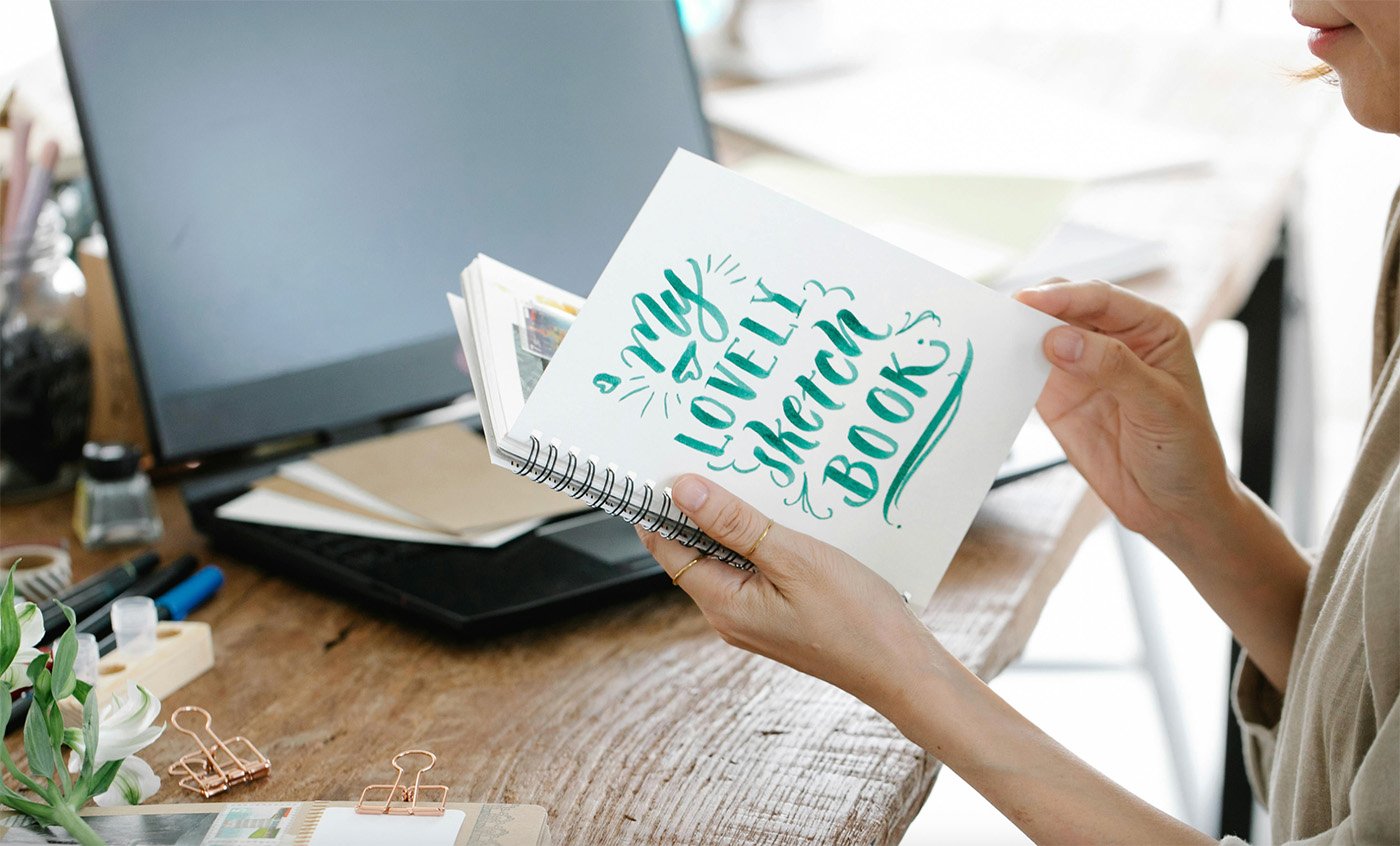 Looking at sketchbook