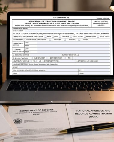 Laptop displaying a military record correction form surrounded by federal FOIA documents on a desk in an editorial setting