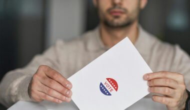Man holding a vote in his hands