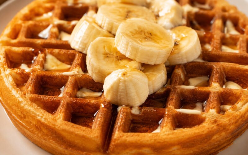 Waffles and Banana Slices with Maple Syrup