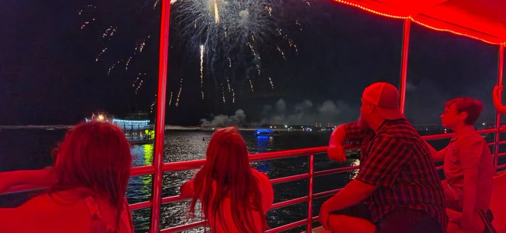 Family watching the Fireworks aboard The Hannah Marie