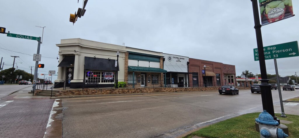 The 101 Goliad block in downtown Rockwall on Oct. 3, 2026, with Coldwell Banker Apex Realtors and the Rockwall Professional Building among the businesses visible along the street.
