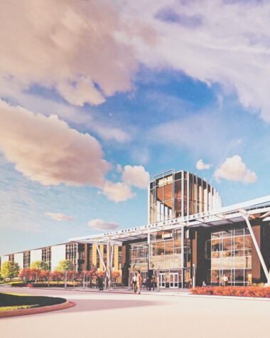 Architectural rendering of the planned Kevin Worthy Fate High School campus in Fate, Texas, showing the main entrance and exterior design.