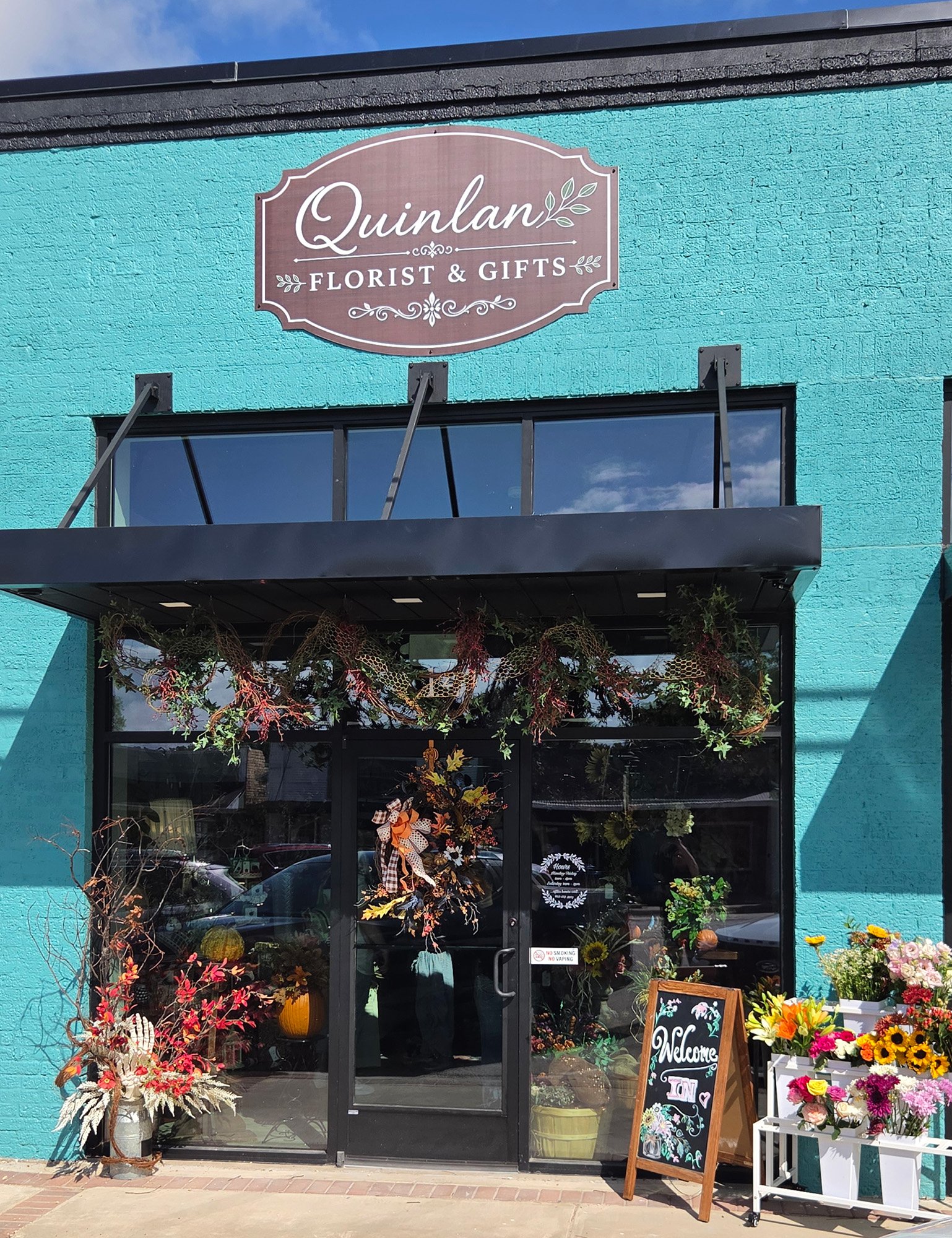 Exterior view of Quinlan Florist & Gifts in October